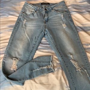 Distressed light wash jeans